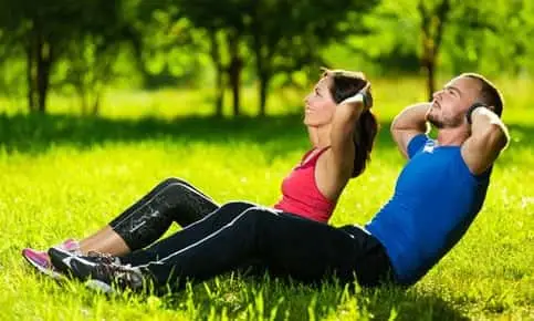 man and woman core exercise