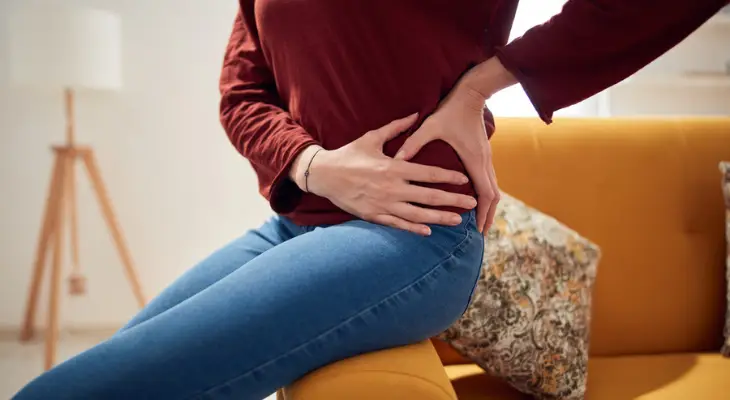 woman-holds-her-painful-hip